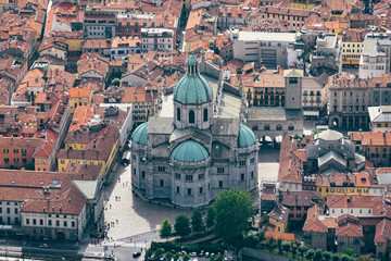 Fototapeta na wymiar Panorama view on old city Como, Italy. Como, Italy. Fantastic aerial view on old city Como. Aerial view of the city of Como and its Cathedral