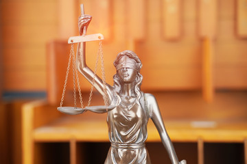 Law theme,Lady Justice Statue on wooden background