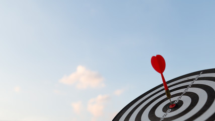 Red dart target arrow hitting on bullseye with,Target marketing and business success concept