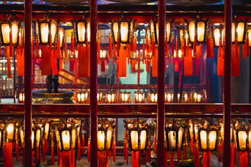 close up chinese lantern glowing in temple