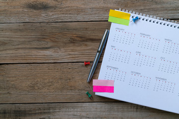 close up of calendar on the table, planning for business meeting or travel planning concept