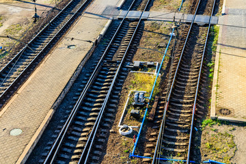 Naklejka premium View on a many railroad tracks and junctions
