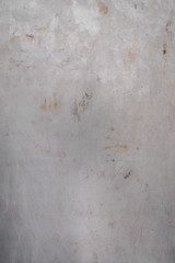 Abstract background. Gray shabby dirty sheet of metal with rust