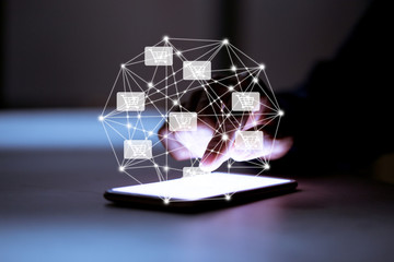 Business using smartphone,with shopping cart icon,sale volume increase make business growth and shopping online concept.