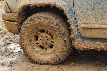 Dirty front wheel 4x4 truck close up