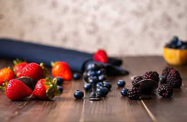 Close-up image of berries isolated, blueberry, strawberry, blackberry