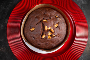 Plum cake made with dried fruit, raisins, cashew nuts, almond etc. Tasty home made cake flavored with cinnamon and spices for sale on Indian Christmas and new year Kerala India.