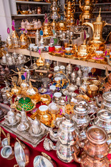 Traditional handmade tea and coffee sets or teapots for sale at the bazar souvenir market in Istanbul, Turkey