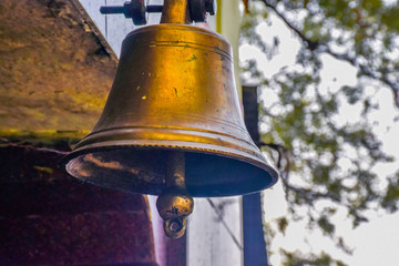 Fototapeta premium Picture of bell made of copper hanging in temple for devotes