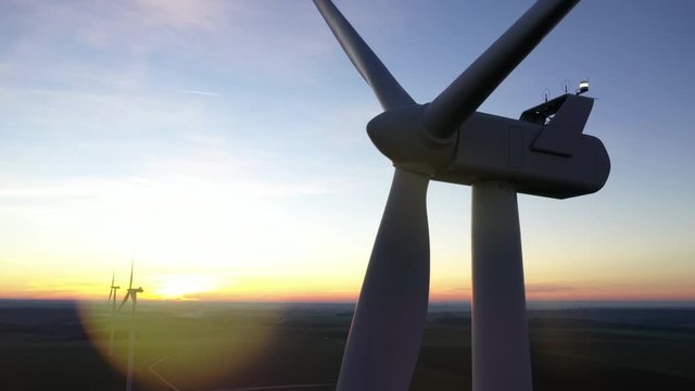 Aerial view of wind turbine at sunset