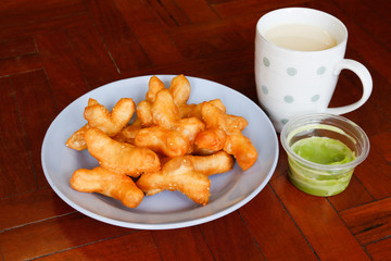 soybean milk and deep-fried doughstick on wood background