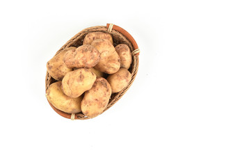 Raw potatoes in a basket for cooking isolated on white background