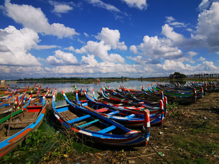 Colorful kayaks on the beach near U Bein Bridge, Mandalay, Myanmar