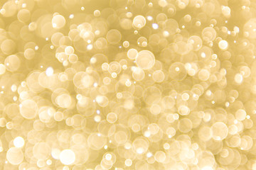 abstract gold background with soft blur bokeh light effect, background bokeh