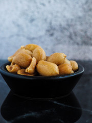 Salted peanuts in a bowl