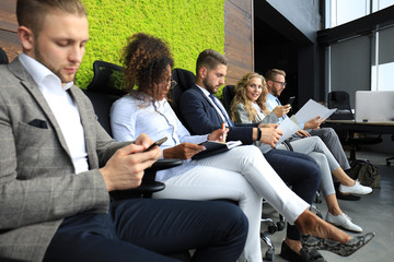 Stressful modern people waiting for job interview.