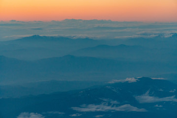 Fototapeta premium aerial of cloud and mountain in the evening