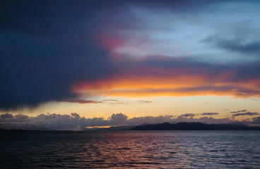 Dramatic cloudy sunset above Sevan Lake. Armenia.