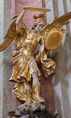 PRAGUE, CZECH REPUBLIC - OCTOBER 18, 2018: The carved polychrome statue of Archangel Michael in church Kostel Svaté Kateřiny Alexandrijské by František Ignác Weiss (1737 - 1741). - obrazy, fototapety, plakaty