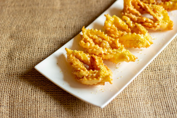 sweet chatter with honey syrup in a white dish