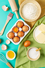Rustic baking ingredients flat lay. Homemade pastry, baking. Top view flat lay background. Copy space. Healthy organic food