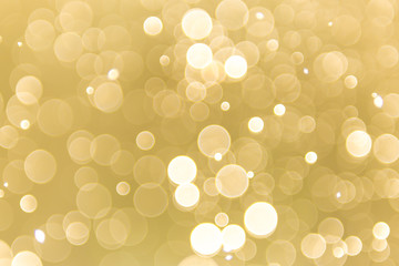 abstract gold background with soft blur bokeh light effect, background bokeh
