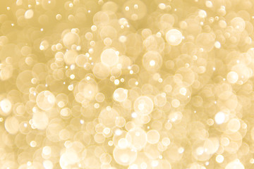 abstract gold background with soft blur bokeh light effect, background bokeh
