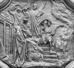 ACIREALE, ITALY - APRIL 11, 2018: The bronze relief of Resurrection of Lazarus from the gate of Basilica Collegiata di San Sebastiano probably from 19. cent.