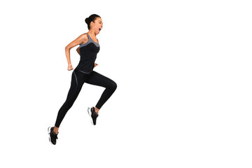 Fototapeta na wymiar Emotional Afro Woman Jumping And Shouting During Workout, Studio