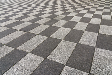 Fototapeta premium Black and white checkered brick background