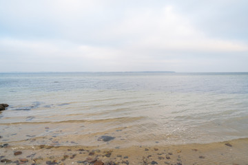 Fototapeta premium Wonderful view of a beach with many stones on and in the water