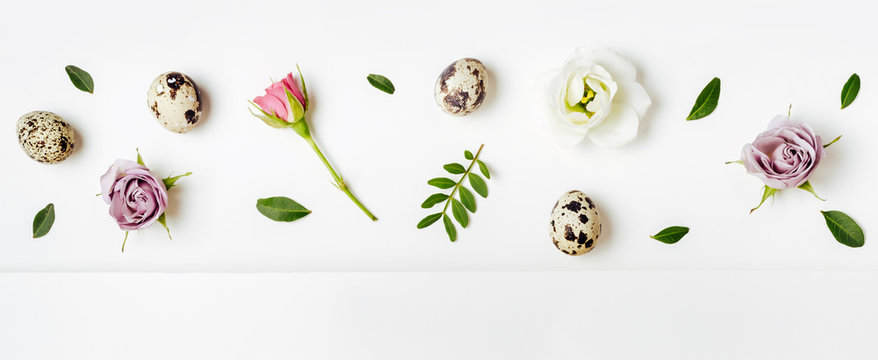 Creative layout floral pattern with quail eggs. Easter minimal concept, anner format