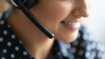 Telesales call center agent wear headset consult customer, closeup view - obrazy, fototapety, plakaty