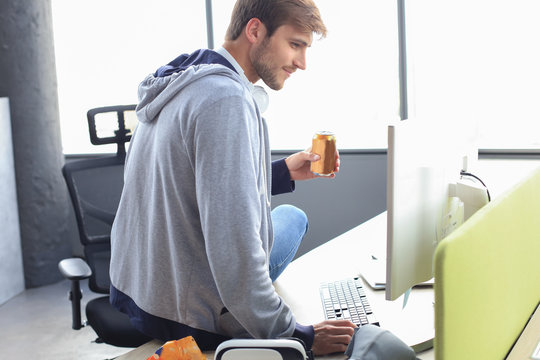 Gamer Drinking An Energy Drink, Concept Of Gaming Lifestyle.