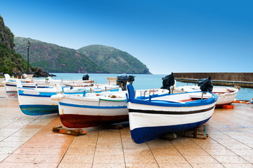 Fototapeta na wymiar typical colored fisherman's boats on Marina Corta Lipari aeolian island, Italy