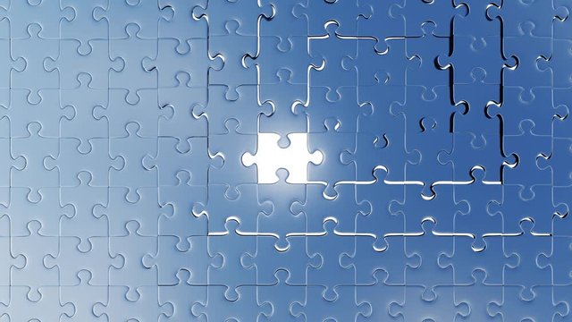 One Large Red piece of puzzle taking its place in the middle of lots of silver pieces