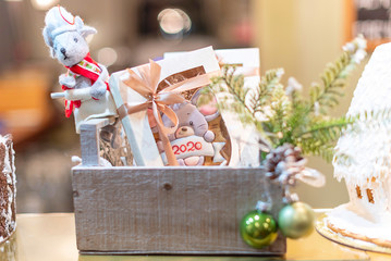 Christmas gift basket with gingerbread with a mouse for the new year 2020, the symbol of the year on the Chinese calendar rat