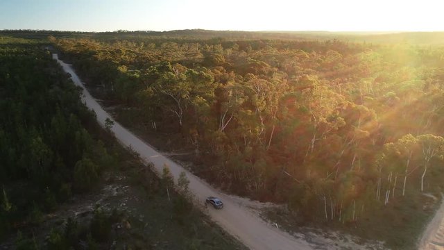 Rally Car driving along dirt road, Sydney, Australia