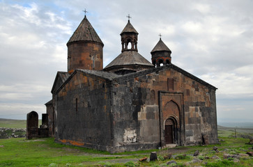 Fototapeta na wymiar Saghmosavank Monastery (13h centuries) is located on the right bank of huge gorge (canyon) of Kasakh River. Saghmosavank village, Aragatsotn Region, Armenia.