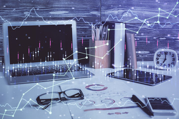 Multi exposure of graph and financial info and work space with computer background. Concept of...