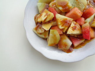 lotis buah or rujak (sweat, sour, spicy and fresh). fruit with hot chili paste. indonesian traditional fruit salad