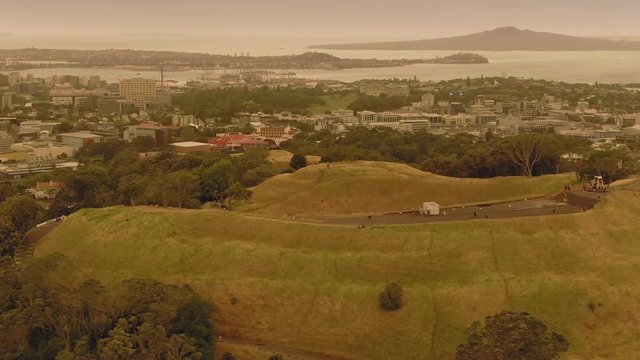 Aerial: Mt Eden And Orange Skies Created From The Australian Bush Fires That Swept Accross The Tasman Sea.  Auckland, New Zealand.  5 January 2019