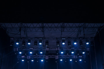 stage light illumination from projectors symmetry night club dark view