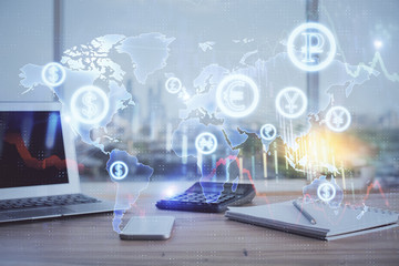 Stock market graph on background with desk and personal computer. Multi exposure. Concept of financial analysis.