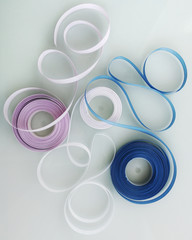 Wrapping ribbon. Swirls of colored ribbons. Decorative materials for gift wrapping and handmade.