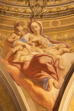 COMO, ITALY - MAY 8, 2015: The fresco of cardinal virtue of Love in church Santuario del Santissimo Crocifisso by Carlo Inncenzo Carloni from 18. cent.