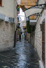 Fototapeta premium street between houses in Italy