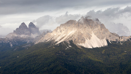 A different view to the most famous Tre Cime di Lavaredo, also known as Drei Zinnen or Three Peaks of Lavaredo. View from Sorapis Circuit Trek. The Dolomites, South Tyrol, Italy. 