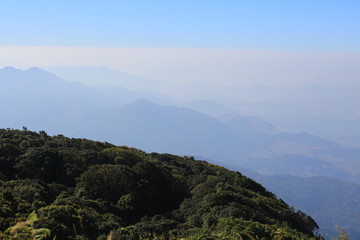 cloud sea view in the far , Chiang rai doi inthanon peak in thailand, the highest mountain in thailand