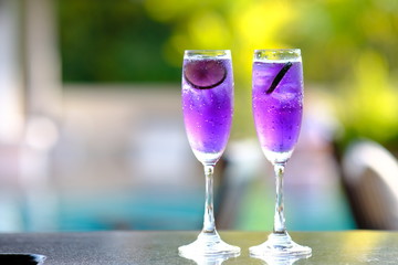glasses on blue cocktails background
